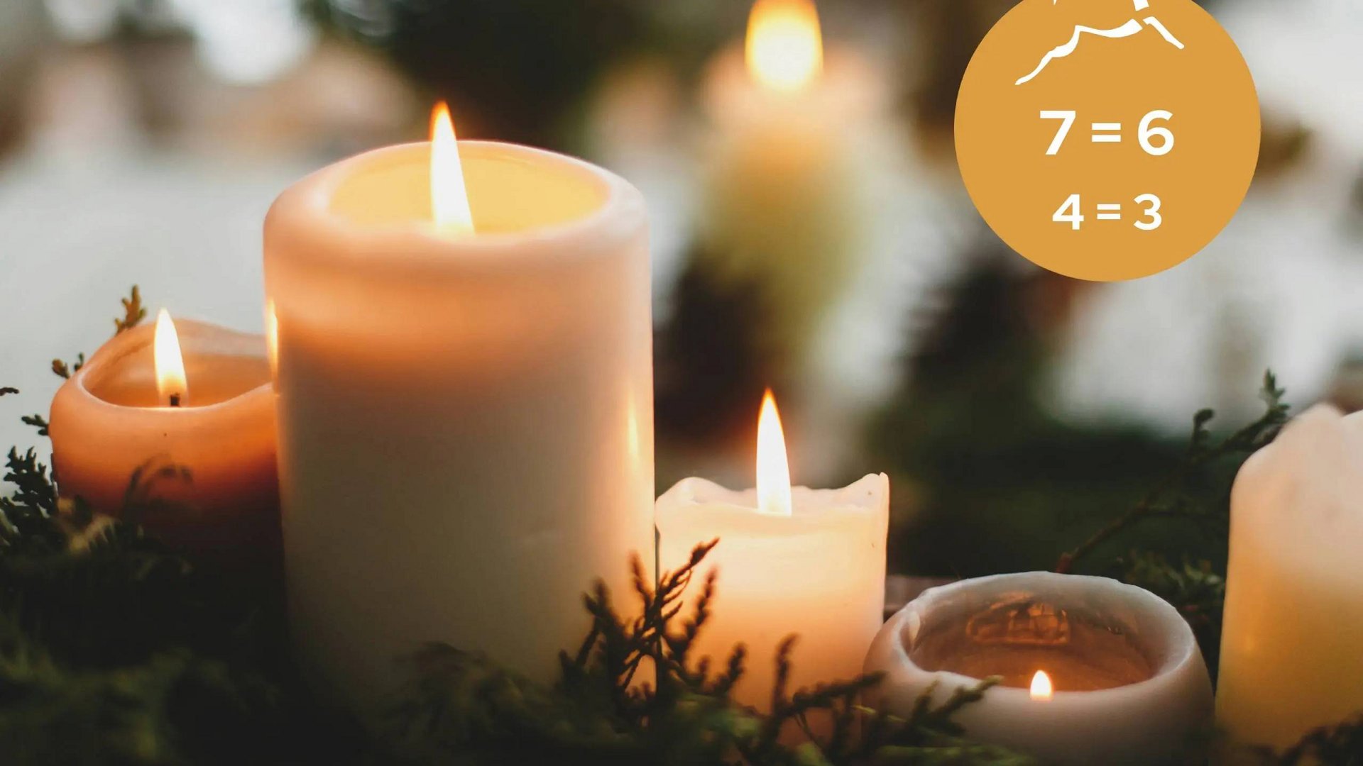 Book our 5-star hotel and enjoy these inclusive services. Lit candles with greenery and symbol for Advent Sundays